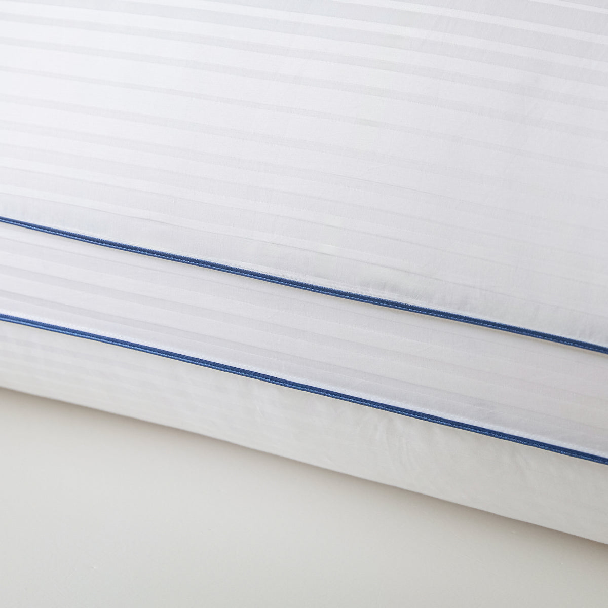 Side profile showing the pillow's supportive structure